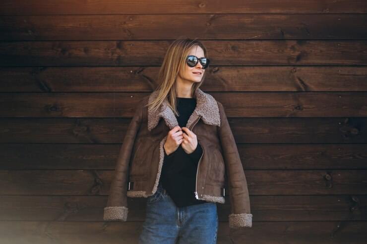 woman-outside-wooden-background